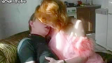 Ginger mom in sexy outfit fucks hubby's younger cousin in XXX clip