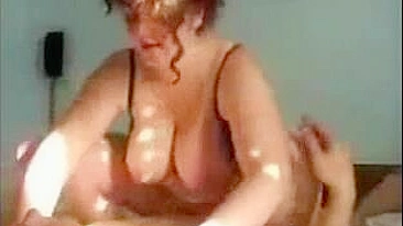 Chubby mom with massive XXX tits bounces her ass on a younger dick