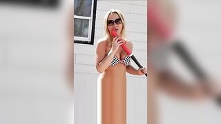 Impaling her asshole on a baseball bat outdoors in the backyard