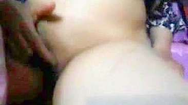 Pregnant Arab mom shows off her shaved twat and sticks dildo into it