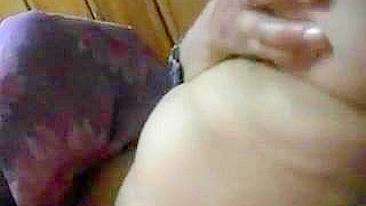 Pregnant Arab mom shows off her shaved twat and sticks dildo into it
