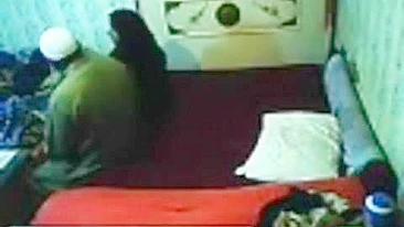 Hidden camera catches horny elderly man fucking Arab mom on the bed