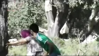 Dressed Arab mom bends by the tree to get fucked hard in the woods