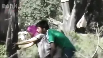 Dressed Arab mom bends by the tree to get fucked hard in the woods