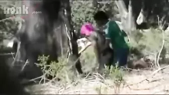 Dressed Arab mom bends by the tree to get fucked hard in the woods