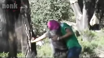 Dressed Arab mom bends by the tree to get fucked hard in the woods