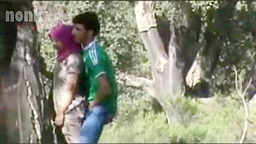 Dressed Arab mom bends by the tree to get fucked hard in the woods