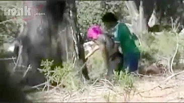 Dressed Arab mom bends by the tree to get fucked hard in the woods