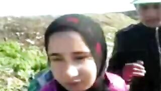 Two Arab guys take slutty mom out to the fields and fuck her there