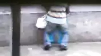 Voyeur catches shameless mom getting fucked by Arab man in public