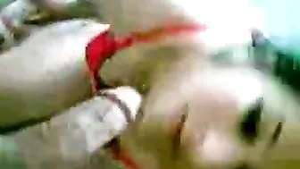 Amateur mom in red lingerie poses for Arab dude's cam when fucking