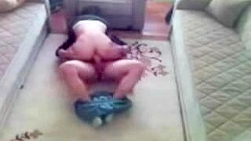 Young Arab mom lies on the carpet and has her vagina plowed by BF