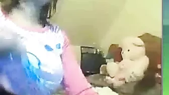 Arab webcam mom smokes and demonstrates her perky breasts on cam