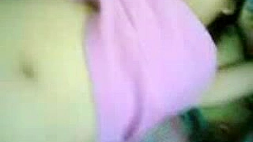 Lustful man takes sleeping Arab mom's panties off to play with pussy