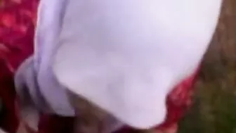 Uninhibited Arab mom in hijab pleases hubby with outdoor blowjob