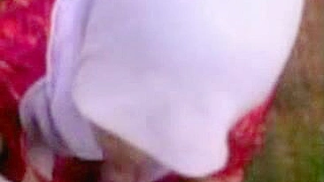 Uninhibited Arab mom in hijab pleases hubby with outdoor blowjob