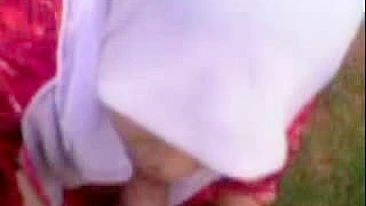 Uninhibited Arab mom in hijab pleases hubby with outdoor blowjob