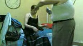 Homemade porn video of fat boss fucking Arab mom in the dark room