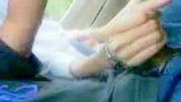 Lucky man enjoys amateur handjob from Arab mom while driving the car