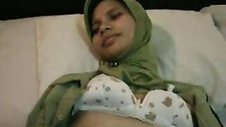 Attractive young mom in hijab shows tits and gets pounded in POV