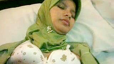 Attractive young mom in hijab shows tits and gets pounded in POV