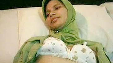 Attractive young mom in hijab shows tits and gets pounded in POV