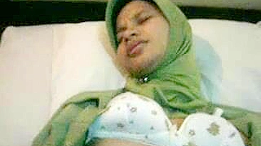 Attractive young mom in hijab shows tits and gets pounded in POV