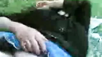 Close-up video of mature mom taking dick into shaved twat outdoors