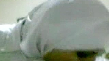 Man enjoys amateur blowjob from attractive Arab mom in white hijab