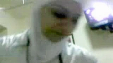 Man enjoys amateur blowjob from attractive Arab mom in white hijab