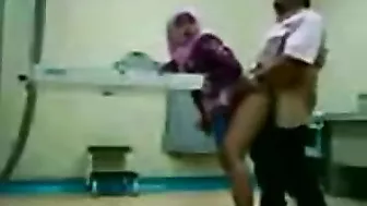 Dirty Arab gynecologist fucks cute mom from behind in the cabinet