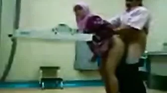 Dirty Arab gynecologist fucks cute mom from behind in the cabinet