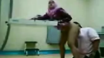 Dirty Arab gynecologist fucks cute mom from behind in the cabinet