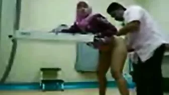 Dirty Arab gynecologist fucks cute mom from behind in the cabinet