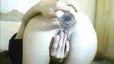 Arab mom gets horny after prayer and sticks dildo into her anal hole