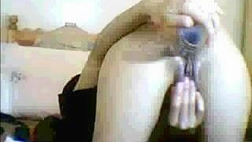 Arab mom gets horny after prayer and sticks dildo into her anal hole