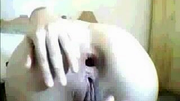 Arab mom gets horny after prayer and sticks dildo into her anal hole