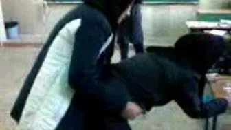 Several Arab girls in hijab play naughty games in the classroom