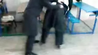 Several Arab girls in hijab play naughty games in the classroom