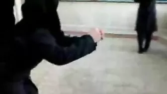 Several Arab girls in hijab play naughty games in the classroom