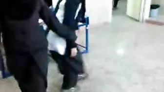 Several Arab girls in hijab play naughty games in the classroom