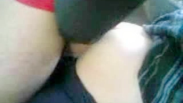 Horny Arab mom strokes her man's dick before car sex in public place