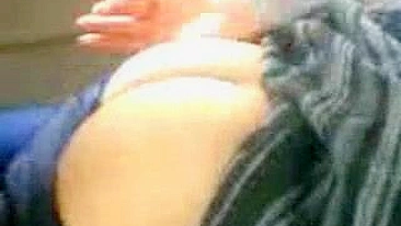 Horny Arab mom strokes her man's dick before car sex in public place