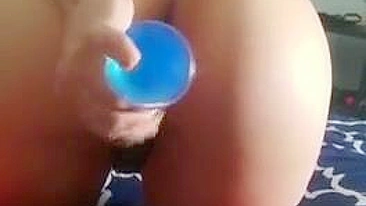 Solo Arab mom inserts large toy in both pussy and as