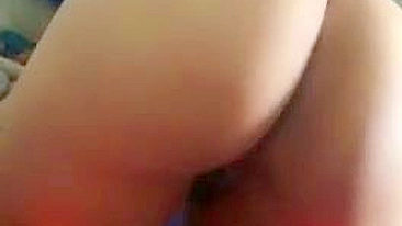 Solo Arab mom inserts large toy in both pussy and as