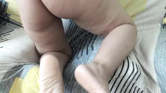 Aroused Arab mom plays with her hairy cunt in sensual home solo