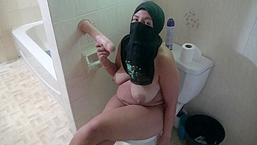 Dirty Arab mom uses her new dildo in bathroom solo XXX
