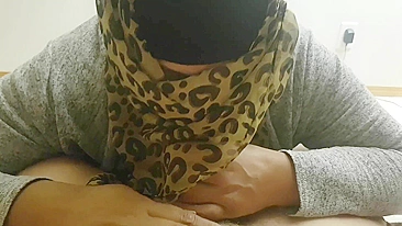 Clothed Arab mom in hijab filmed sucking dick like a slut
