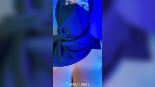 Muslim mistress wife in hijab putting a condom on big strapon