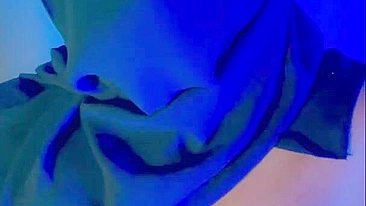 Muslim mistress wife in hijab putting a condom on big strapon